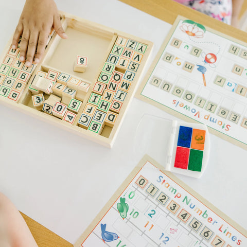 Melissa & Doug Deluxe Wooden Stamp Set ABCs 123s