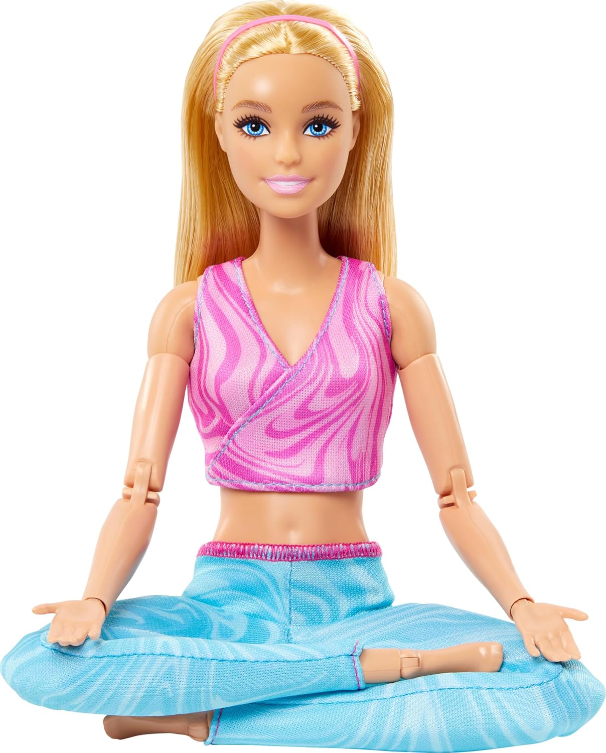 Barbie made to move dolls with 22 incontrolable joints and yoga clothes